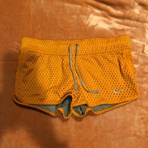 Orange Nike shorts